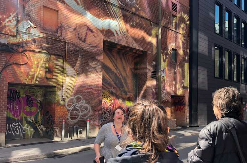 Montreal: Guided Walking Tour of Montreal's Murals - Entertainment District Murals: Phillip Adams and David Guinn in Context