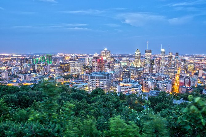 Montreal Premium Driving Night Tour with La Grand Roue Ride - Mount Royal Park: skyline views and a break from street-level chaos