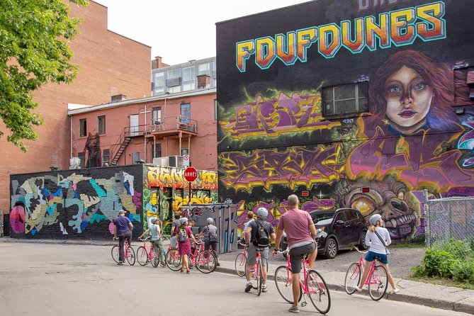 Non Touristy Pink Bike Tour by Spade & Palacio - Stop 2: Leonard Cohen Mural—art you can’t ignore
