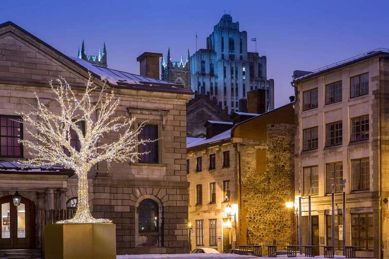 Old Montréal Small-Group Christmas Tour - Starting in the Christmas glow: Victoria Square and the first stories